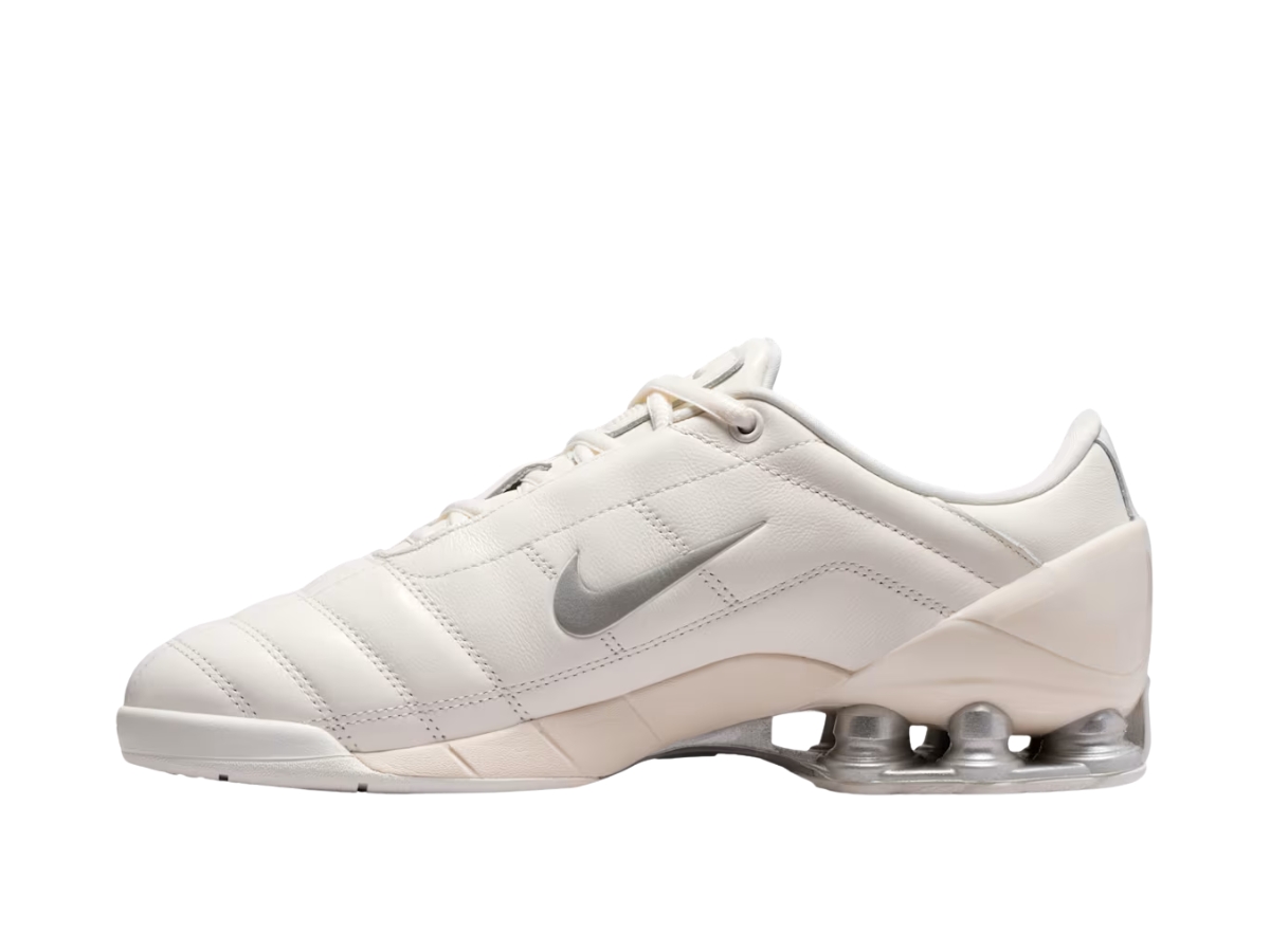 https://d2cva83hdk3bwc.cloudfront.net/io9300-100-nike-total-90-shox-magia-sail-metallic-silver-women-s-2.jpg