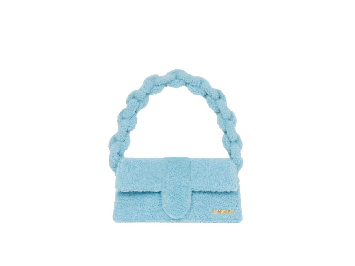 https://d2cva83hdk3bwc.cloudfront.net/jacquemus-le-bambidou-shearling-flap-bag--light-blue-2.jpg
