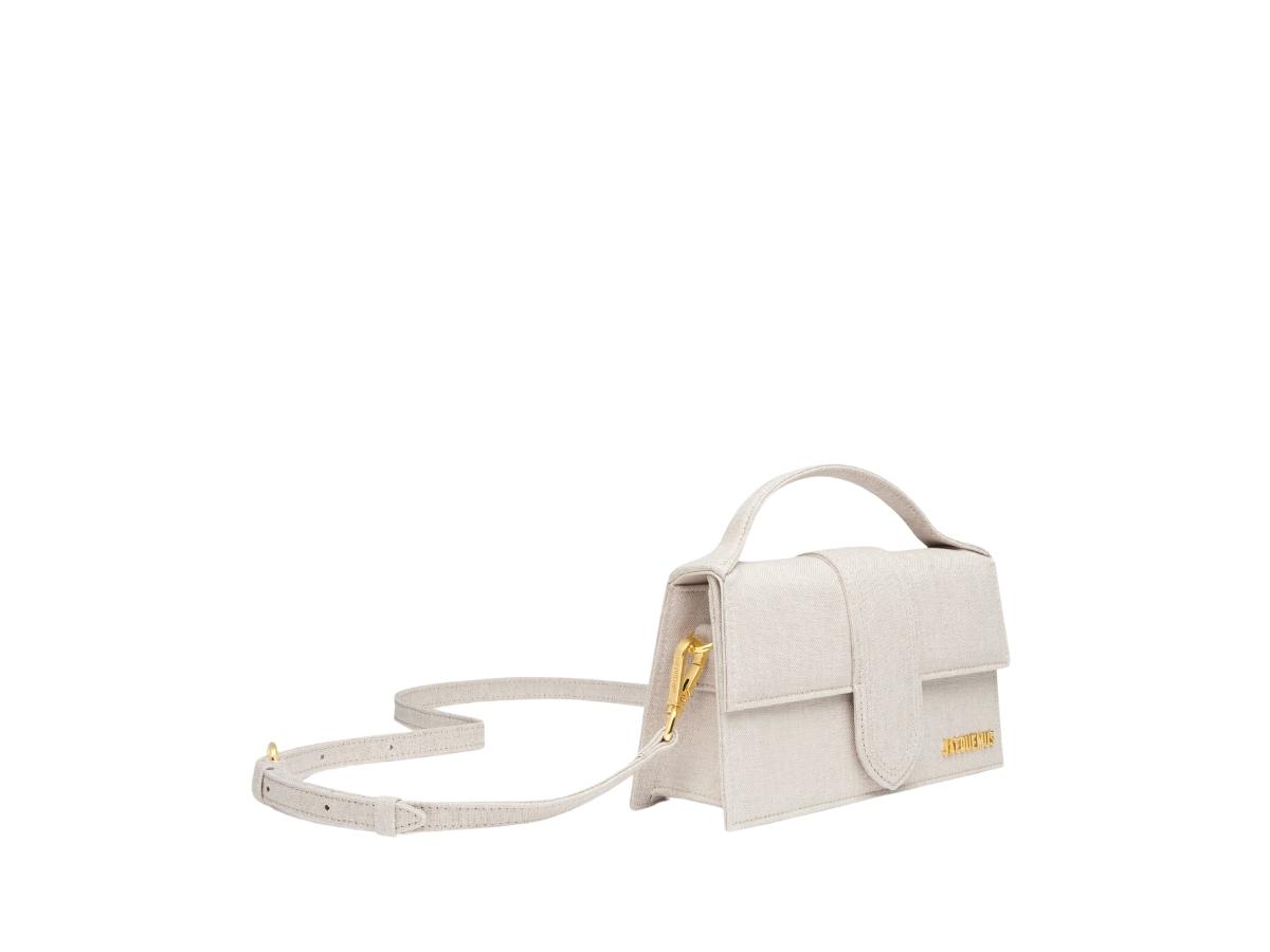 https://d2cva83hdk3bwc.cloudfront.net/jacquemus-le-grand-bambino-in-cotton-linen-with-gold-metal-logo-and-hardware-light-greige-3.jpg