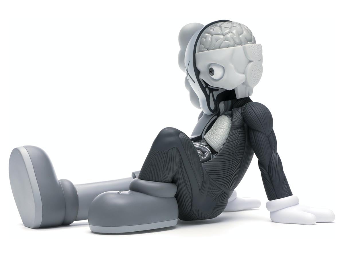 https://d2cva83hdk3bwc.cloudfront.net/kaws-resting-place-vinyl-figure-grey-1.jpg
