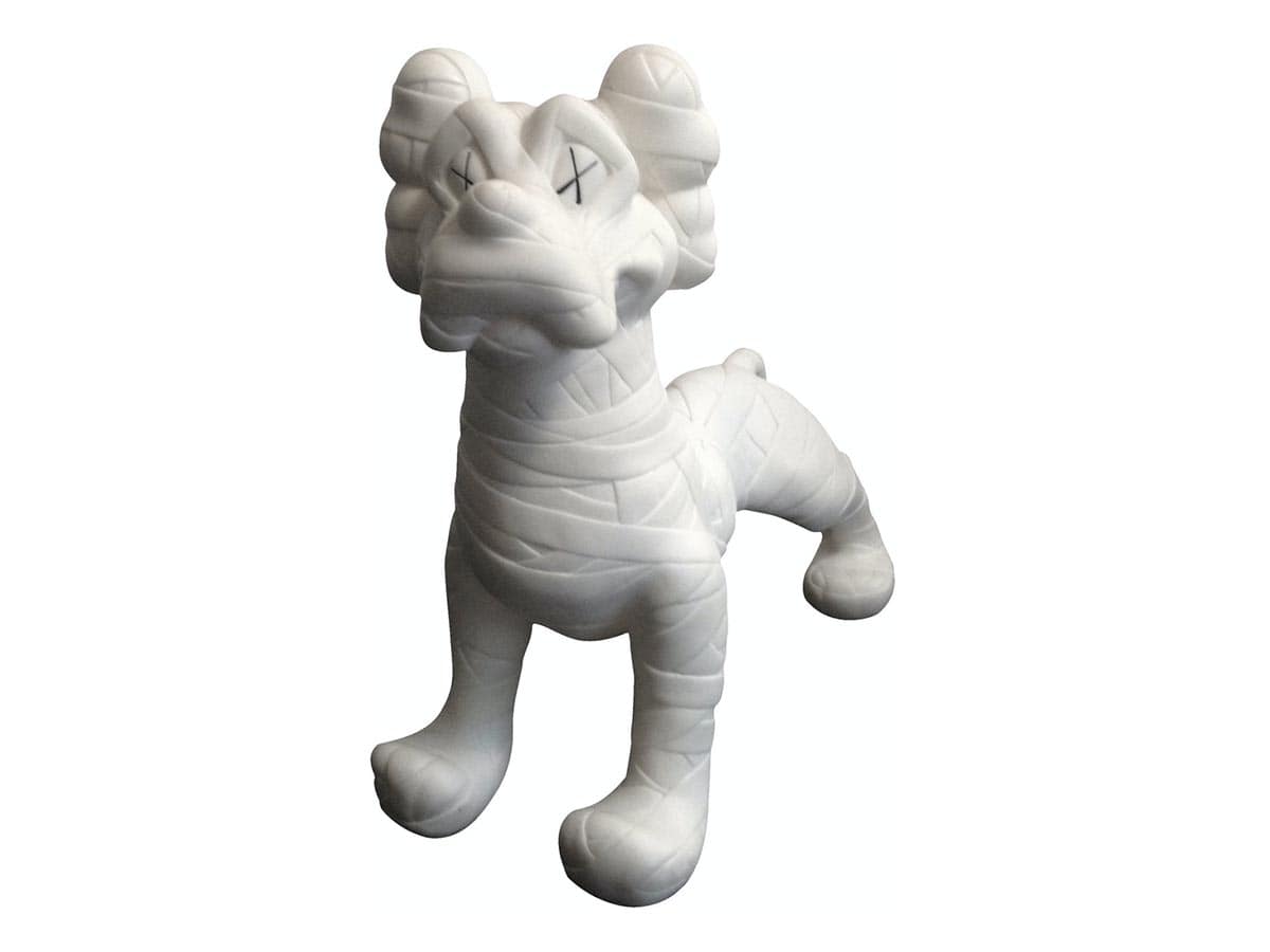 https://d2cva83hdk3bwc.cloudfront.net/kaws-zooth-vinyl-figure-white-1.jpg