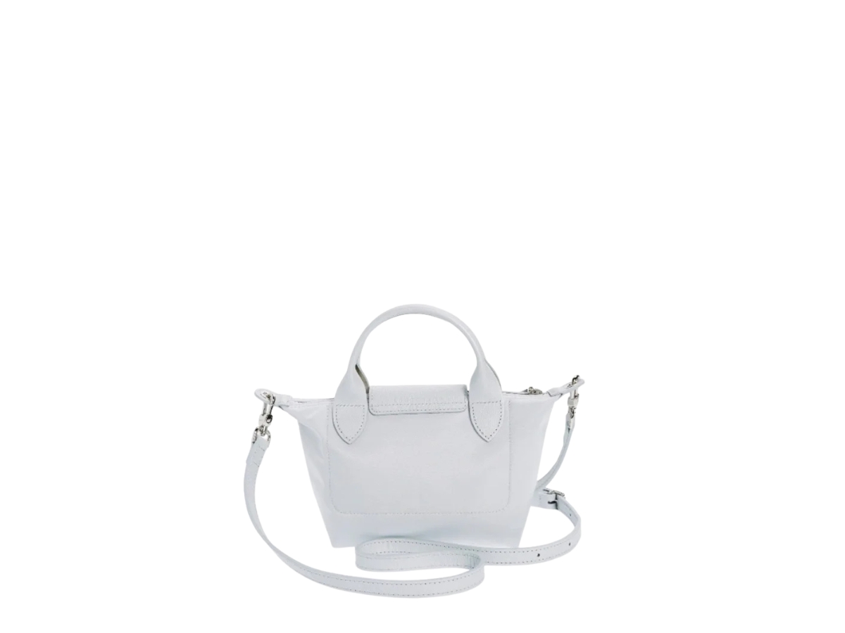 https://d2cva83hdk3bwc.cloudfront.net/lchmp-sbblxlpcbishwlg-longchamp-xs-le-pliage-crossbody-bag-in-silver-hardware-with-light-grey-2.jpg