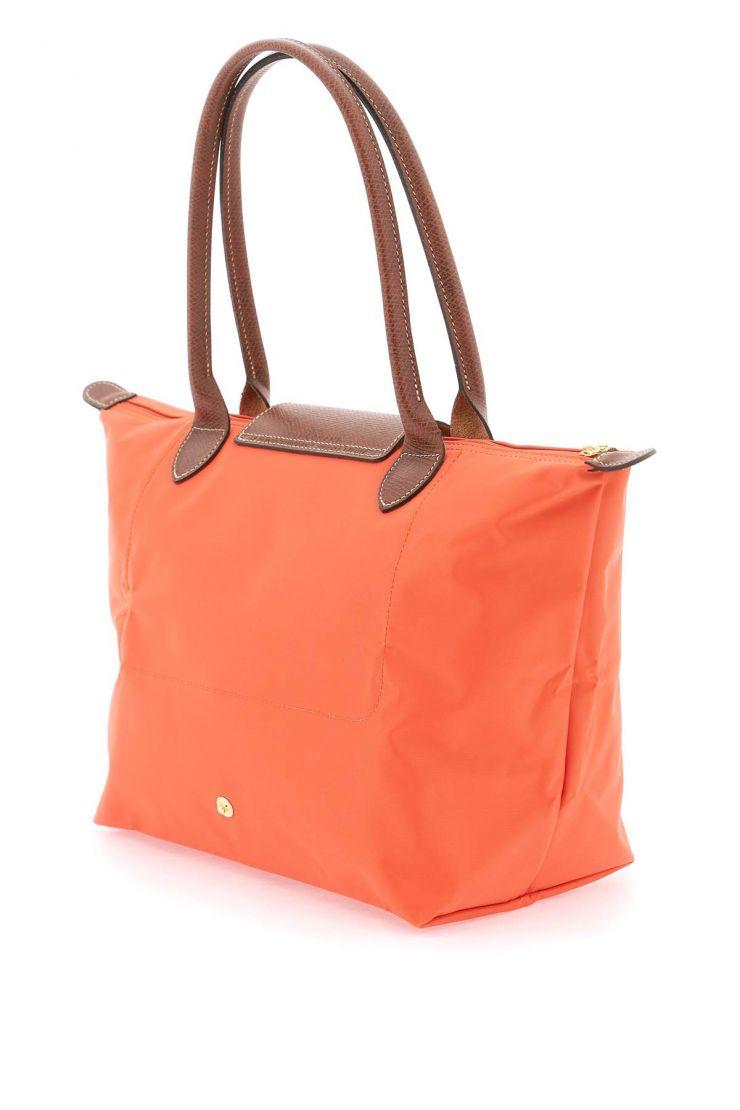 https://d2cva83hdk3bwc.cloudfront.net/le-pliage-original-m-shoulder-bag-longchamp-orange-3.jpg