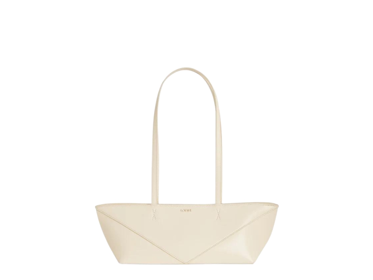 https://d2cva83hdk3bwc.cloudfront.net/loewe-cropped-puzzle-fold-bag-in-shiny-calfskin-chalk-1.jpg