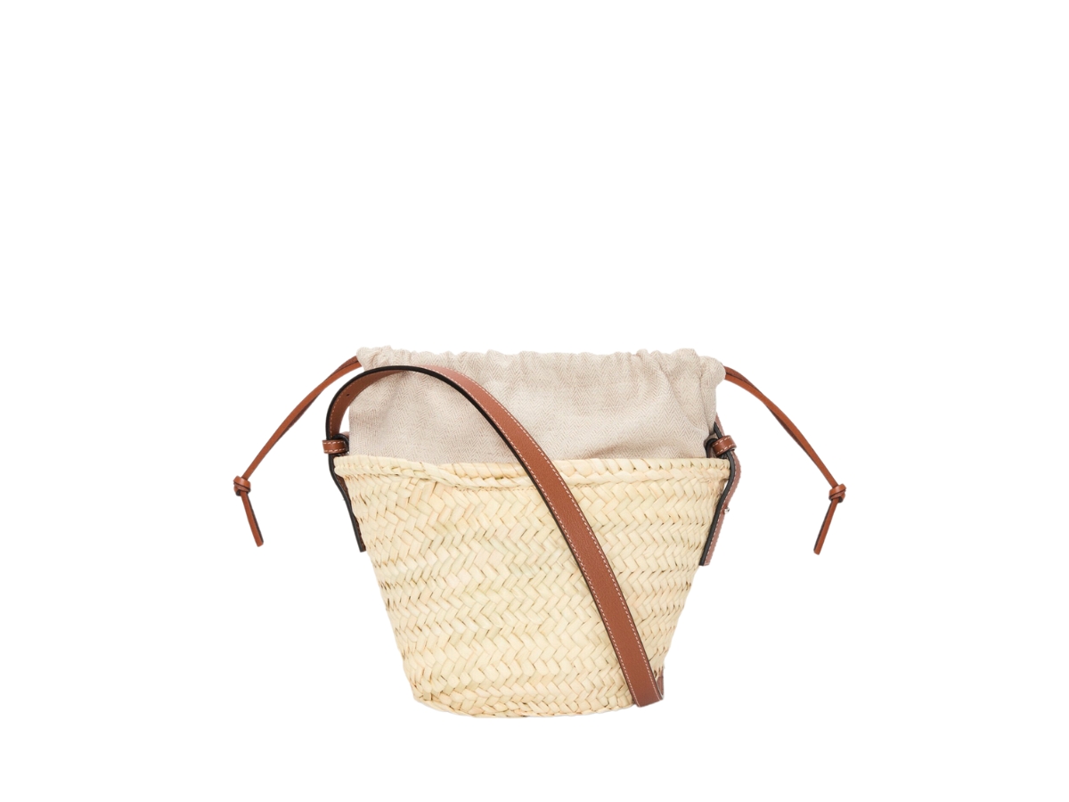 https://d2cva83hdk3bwc.cloudfront.net/loewe-drawstring-bucket-bag-in-palm-leaf-and-calfskin-with-palladium-metallic-colour-natural-tan-2.jpg
