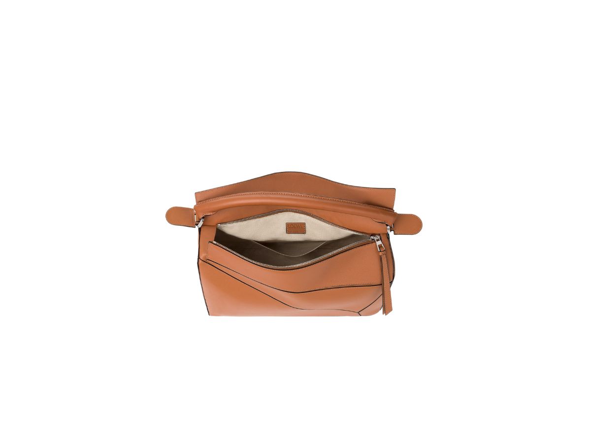 https://d2cva83hdk3bwc.cloudfront.net/loewe-large-puzzle-bag-in-classic-calfskin-with-palladium-hardware-tan-3.jpg