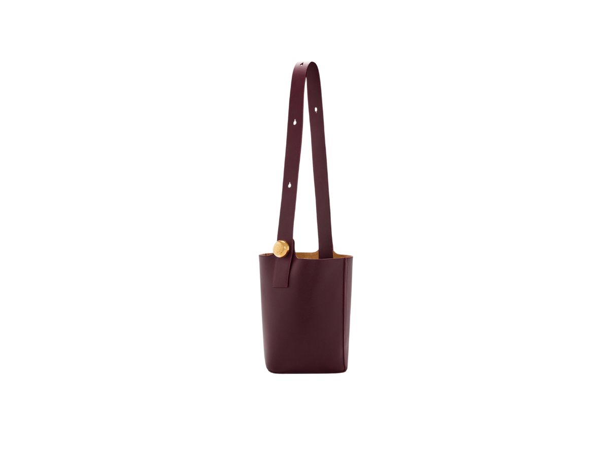 https://d2cva83hdk3bwc.cloudfront.net/loewe-medium-pebble-bucket-bag-in-mellow-calfskin-dark-burgundy-3.jpg
