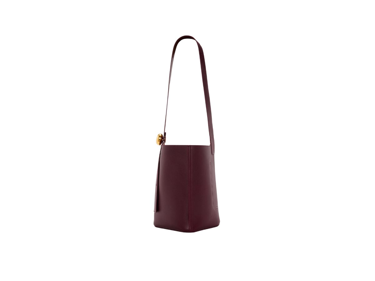 https://d2cva83hdk3bwc.cloudfront.net/loewe-medium-pebble-bucket-bag-in-mellow-calfskin-dark-burgundy-4.jpg
