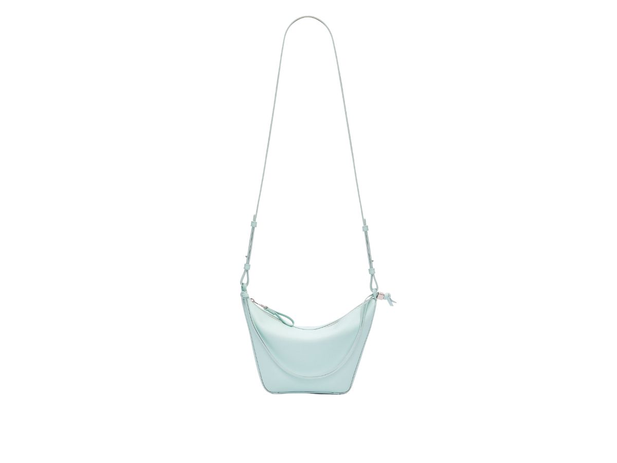 https://d2cva83hdk3bwc.cloudfront.net/loewe-mini-hammock-hobo-bag-in-classic-calfskin-with-palladium-metallic-blue-iceberg-4.jpg
