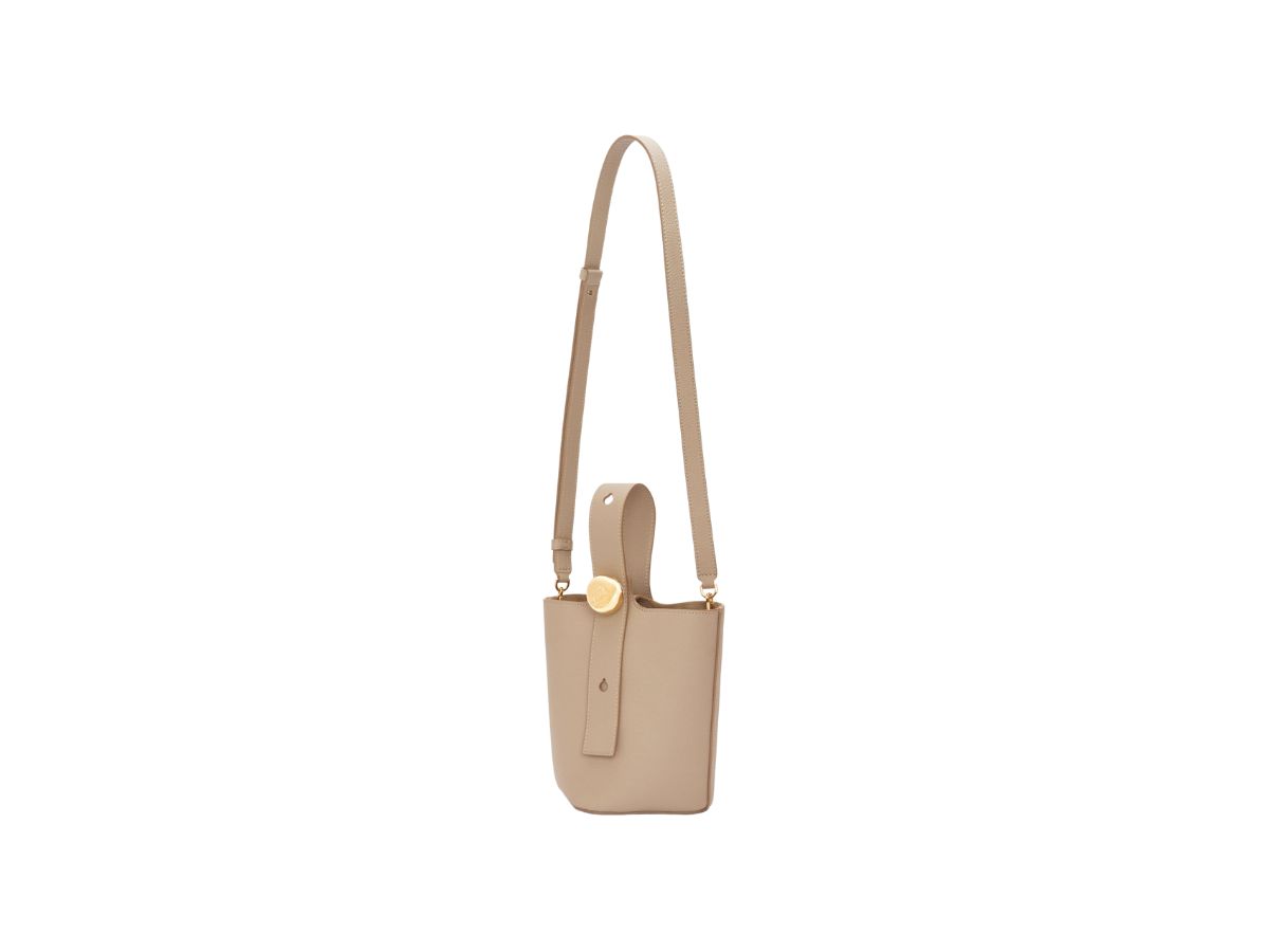 https://d2cva83hdk3bwc.cloudfront.net/loewe-mini-pebble-bucket-bag-in-soft-grained-calfskin-sand-4.jpg