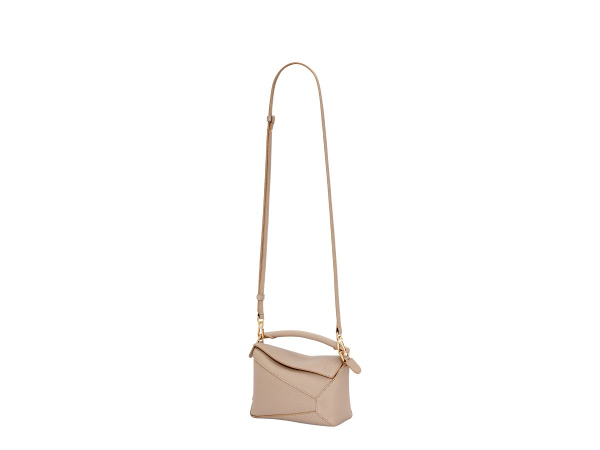 https://d2cva83hdk3bwc.cloudfront.net/loewe-mini-puzzle-bag-in-soft-grained-calfskin-sand-3.jpg