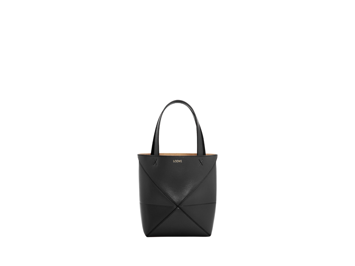 https://d2cva83hdk3bwc.cloudfront.net/loewe-mini-puzzle-fold-tote-in-shiny-calfskin-with-gold-embossed-black-1.jpg