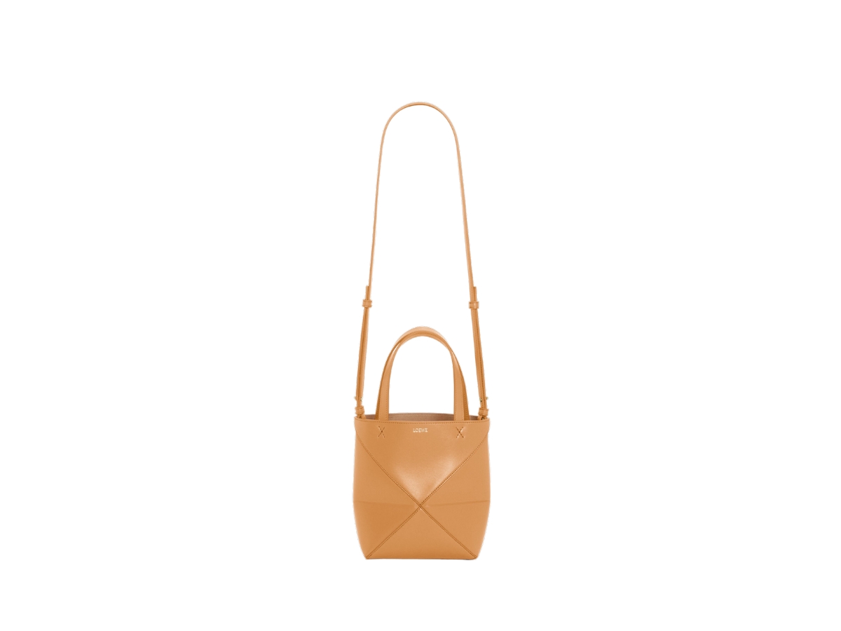 https://d2cva83hdk3bwc.cloudfront.net/loewe-mini-puzzle-fold-tote-in-shiny-calfskin-with-gold-embossed-warm-desert-3.jpg