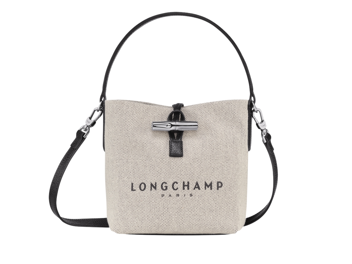 https://d2cva83hdk3bwc.cloudfront.net/longchamp-essential-xs-bucket-bag-flecked-cotton-canvas-silver-hardware-ecru-1.jpg