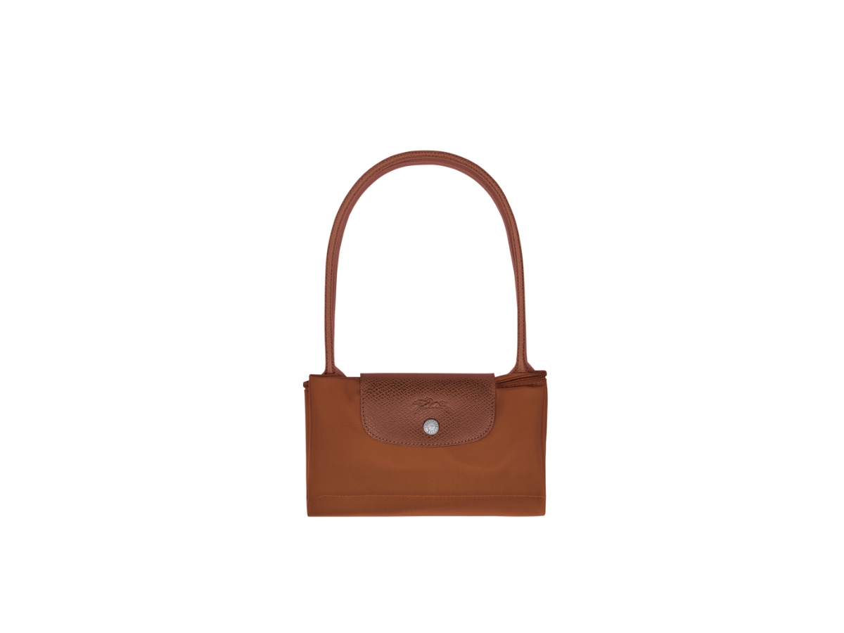 https://d2cva83hdk3bwc.cloudfront.net/longchamp-le-pliage-green-m-tote-bag-in-recycled-polyamide-canvas-with-silver-color-metallic-hardware-cognac-3.jpg