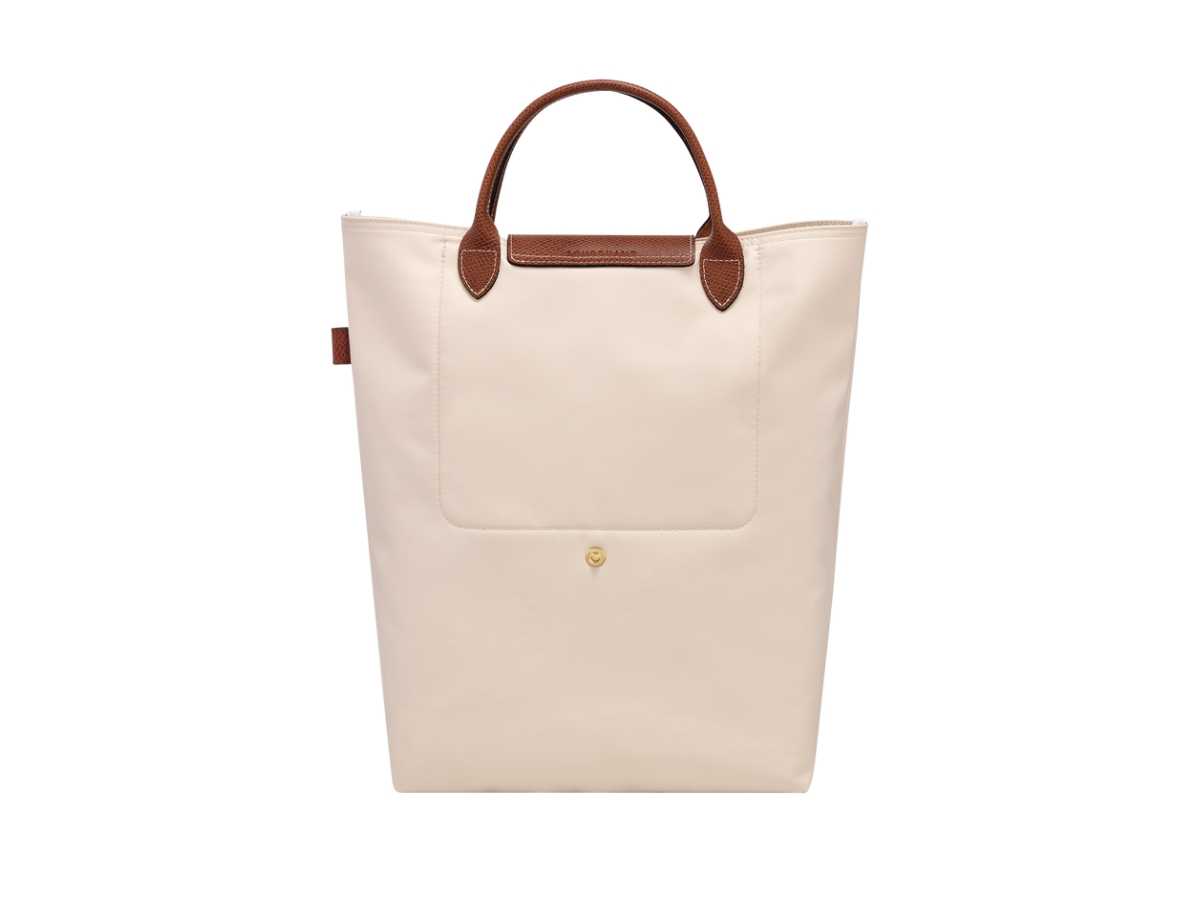 https://d2cva83hdk3bwc.cloudfront.net/longchamp-le-pliage-original-m-tote-bag-in-recycled-polyamide-canvas-with-gold-color-paper-2.jpg