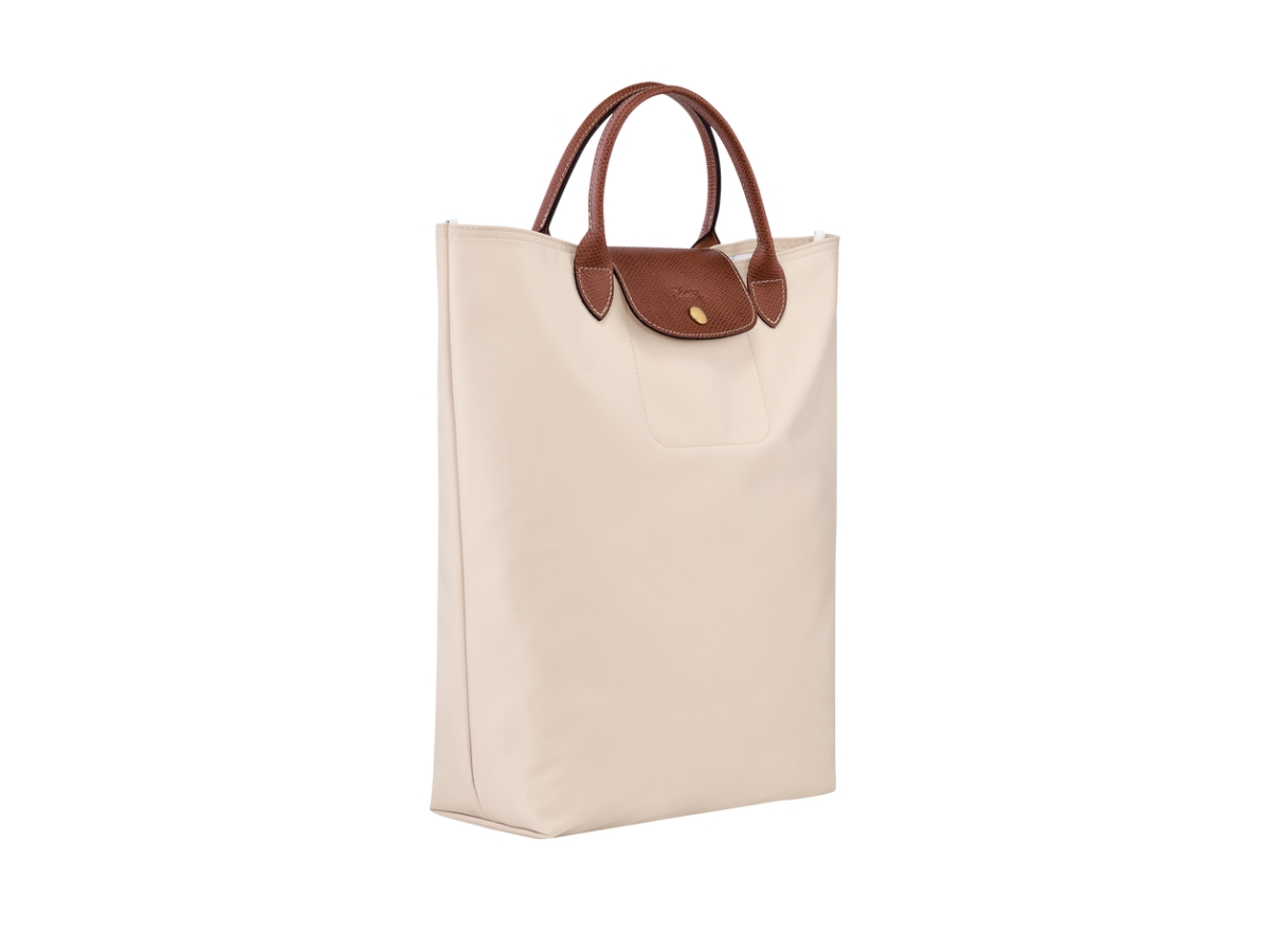 https://d2cva83hdk3bwc.cloudfront.net/longchamp-le-pliage-original-m-tote-bag-in-recycled-polyamide-canvas-with-gold-color-paper-3.jpg