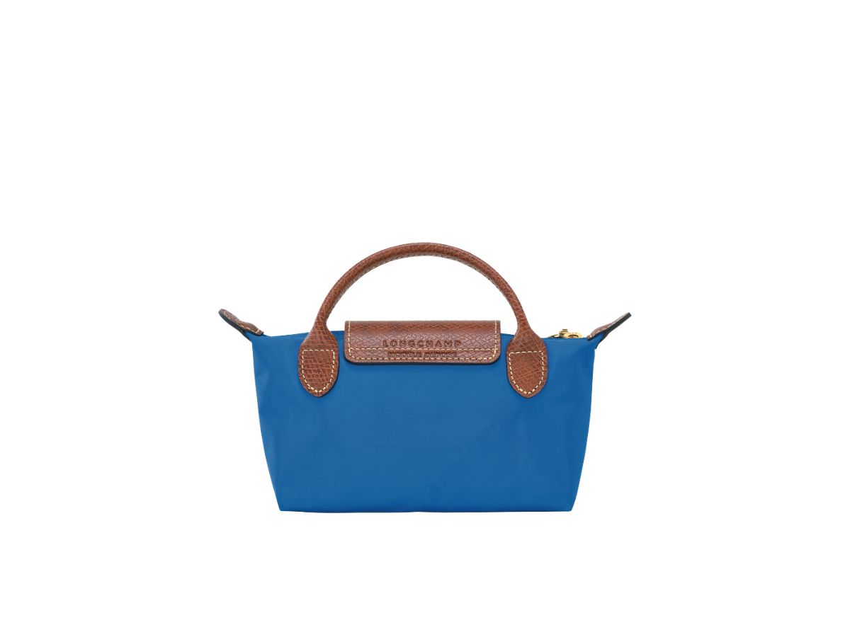 https://d2cva83hdk3bwc.cloudfront.net/longchamp-le-pliage-original-pouch-with-handle-in-recycled-canvas-with-gold-hardware-cobalt-2.jpg