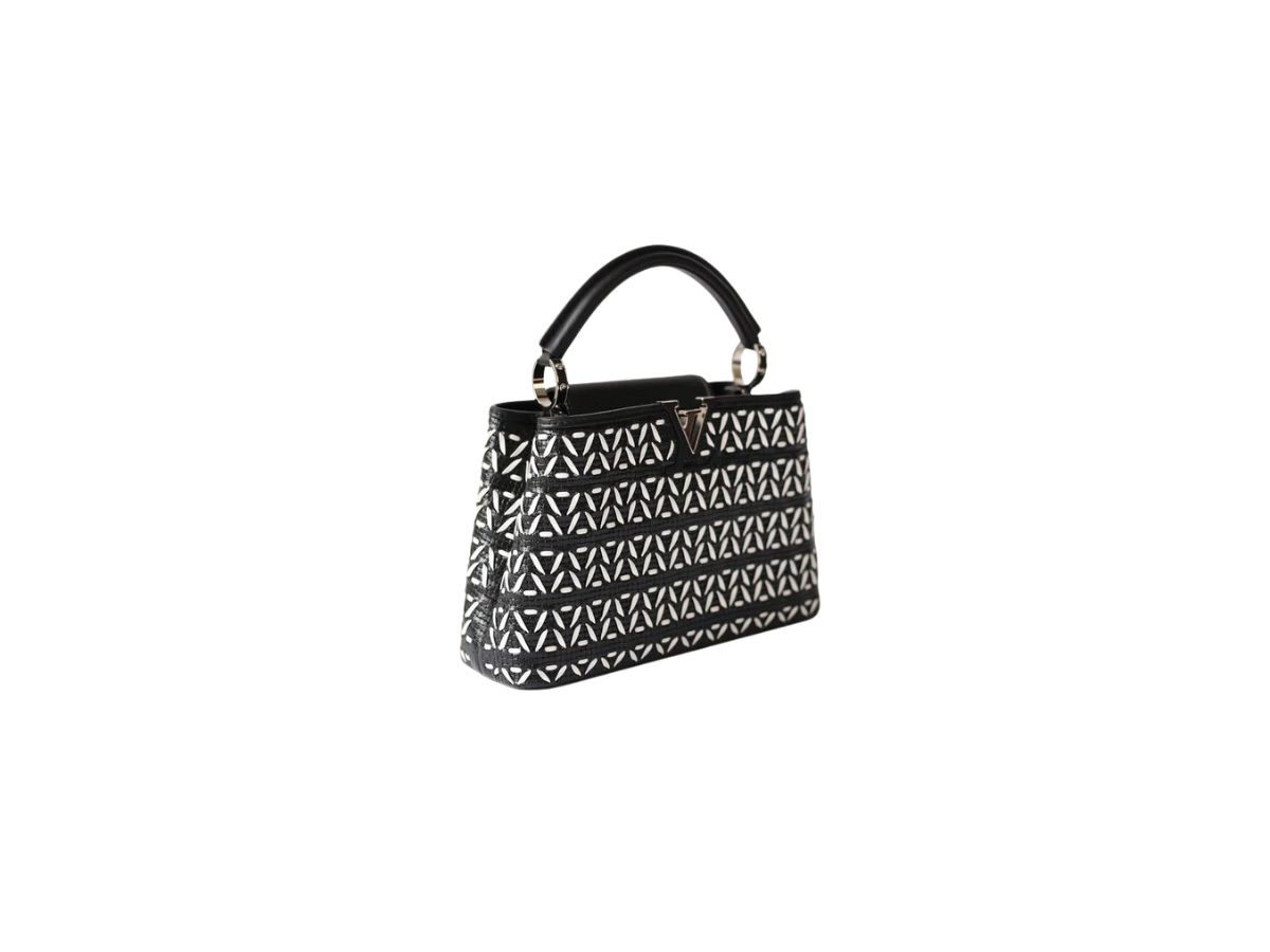 https://d2cva83hdk3bwc.cloudfront.net/louis-vuitton-capucines-bb-in-black-and-white-plaited-leather-with-with-silver-color-hardware-3.jpg