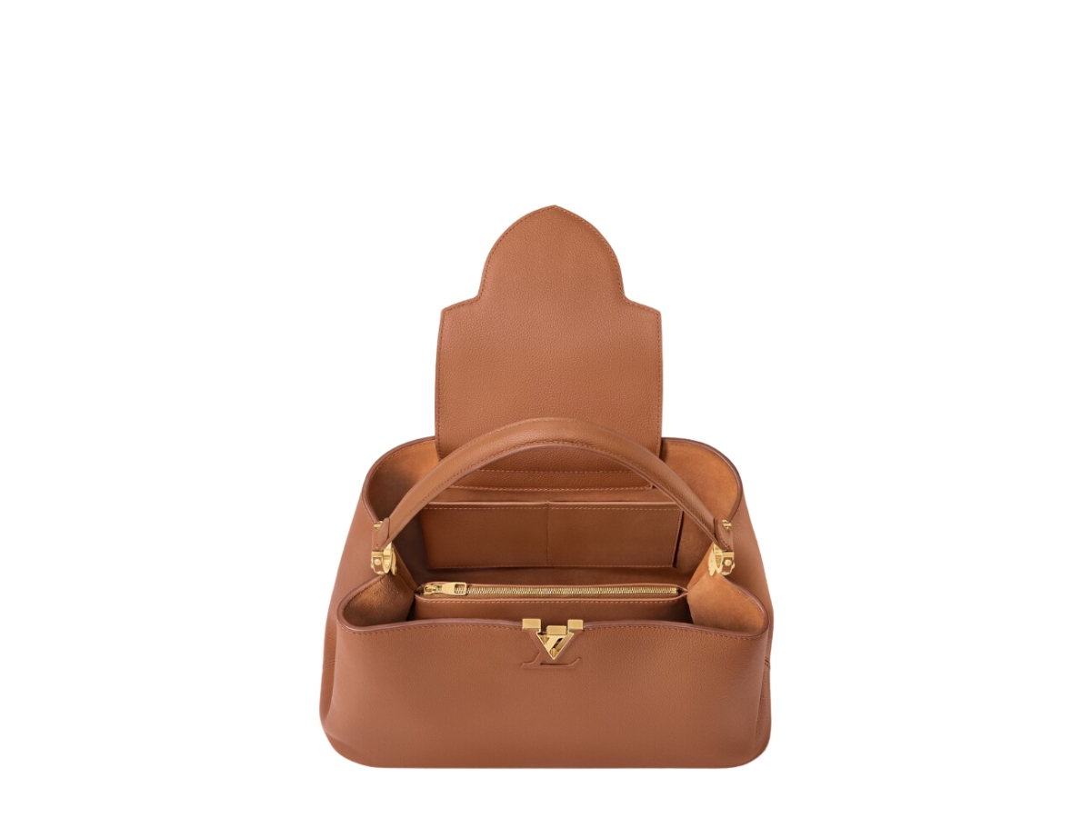https://d2cva83hdk3bwc.cloudfront.net/louis-vuitton-capucines-gm-souple-in-smooth-and-grained-calfskin-with-gold-color-hardware-cognac-3.jpg