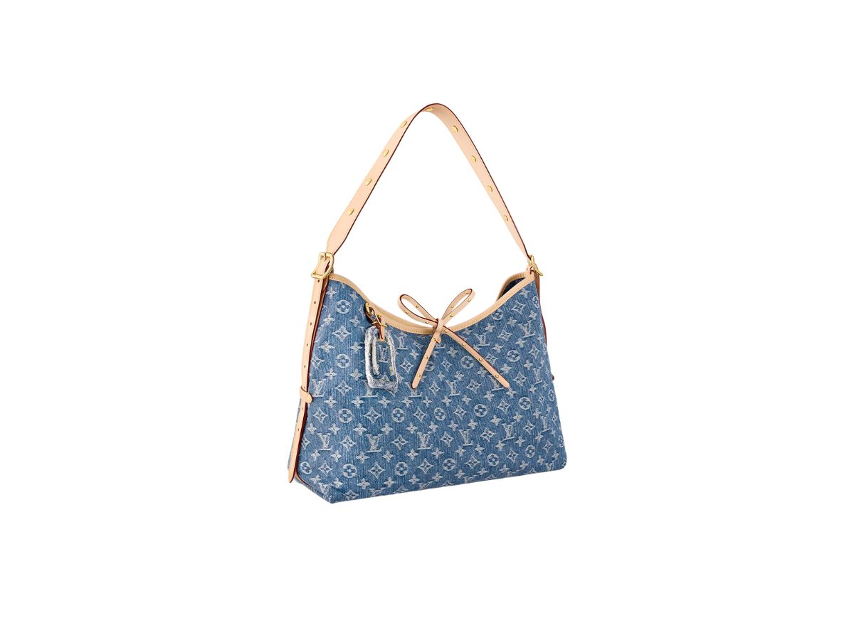 https://d2cva83hdk3bwc.cloudfront.net/louis-vuitton-carryall-mm-in-monogram-denim-canvas-with-gold-color-hardware-denim-blue-2.jpg
