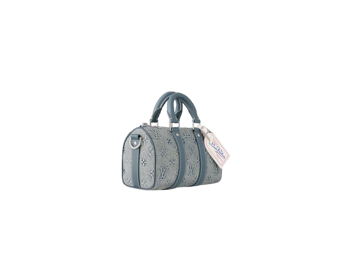 https://d2cva83hdk3bwc.cloudfront.net/louis-vuitton-keepall-bandouli-re-25-in-monogram-washed-denim-canvas-with-silver-color-hardware-2.jpg
