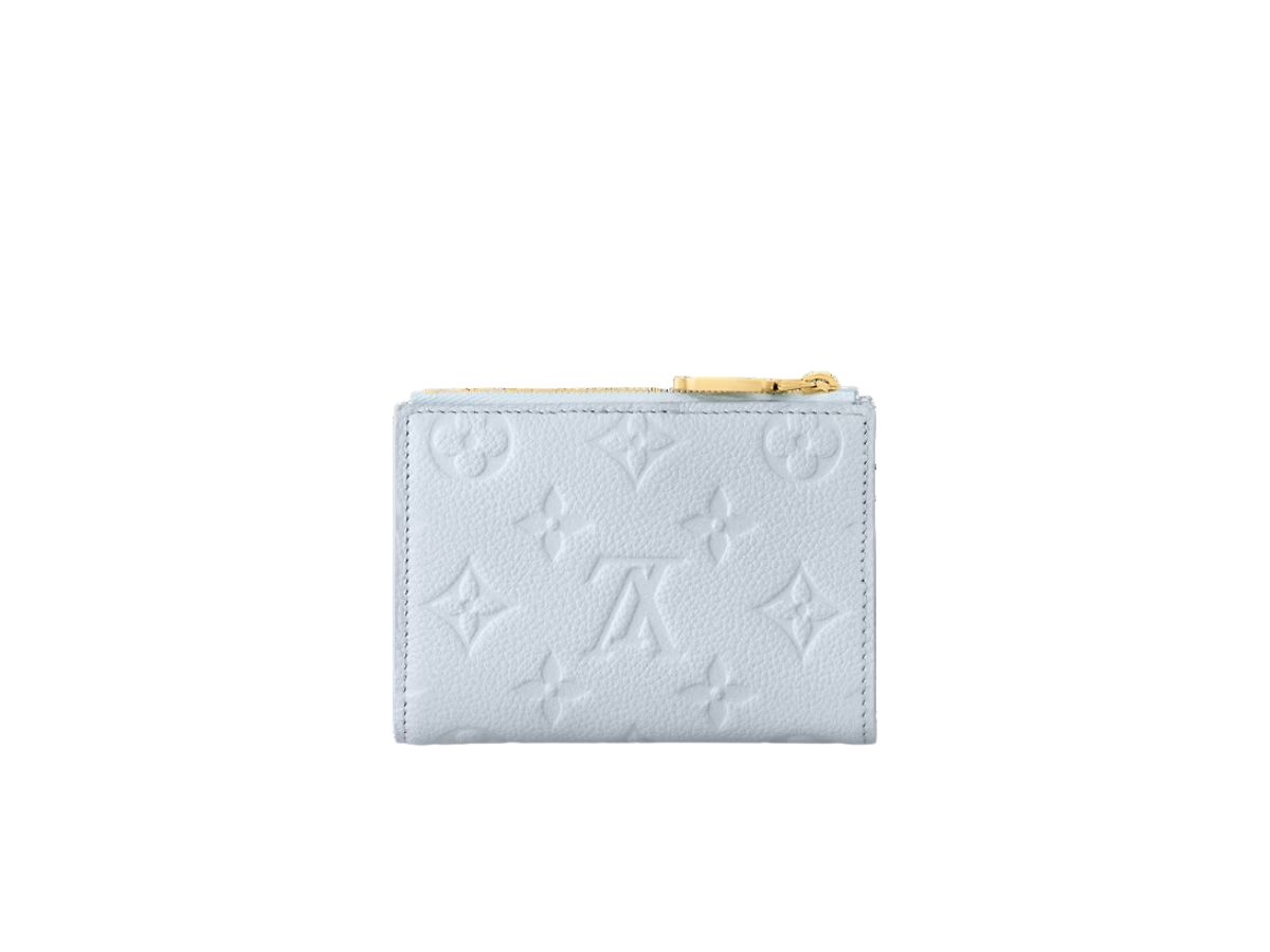 https://d2cva83hdk3bwc.cloudfront.net/louis-vuitton-lisa-wallet-in-monogram-empreinte-leather-with-gold-color-hardware-olympe-blue-4.jpg