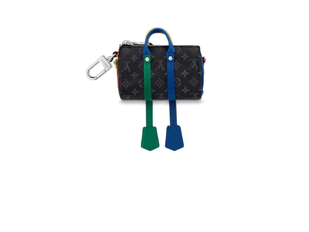 https://d2cva83hdk3bwc.cloudfront.net/louis-vuitton-mister-keepall-bag-charm-and-keychain-in-blue-leather-with-silver-color-hardware-2.jpg