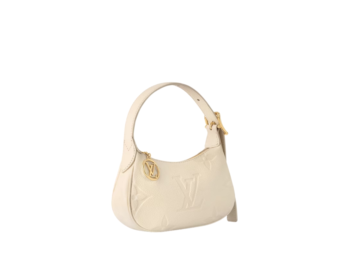 https://d2cva83hdk3bwc.cloudfront.net/louis-vuitton-moon-mini-bag-in-monogram-empreinte-embossed-supple-grained-cowhide-leather-with-gold-color-hardware-cream-3.jpg