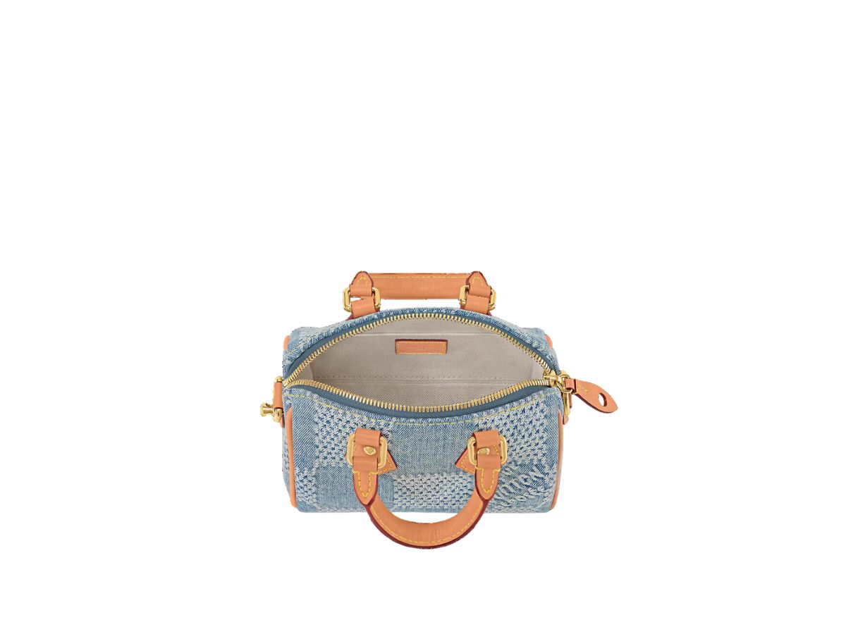 https://d2cva83hdk3bwc.cloudfront.net/louis-vuitton-speedy-18-bandouli-re-in-damier-denim-3d-cotton-canvas-with-gold-color-hardware-blue-3.jpg
