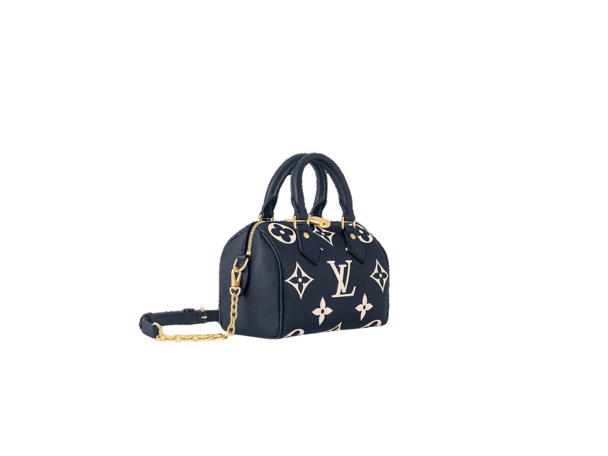https://d2cva83hdk3bwc.cloudfront.net/louis-vuitton-speedy-bandouli-re-20-in-monogram-empreinte-leather-with-gold-color-hardware-navy-blue-cream-2.jpg