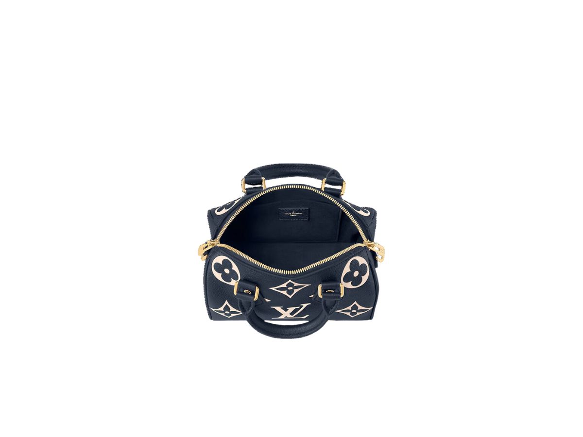 https://d2cva83hdk3bwc.cloudfront.net/louis-vuitton-speedy-bandouli-re-20-in-monogram-empreinte-leather-with-gold-color-hardware-navy-blue-cream-3.jpg