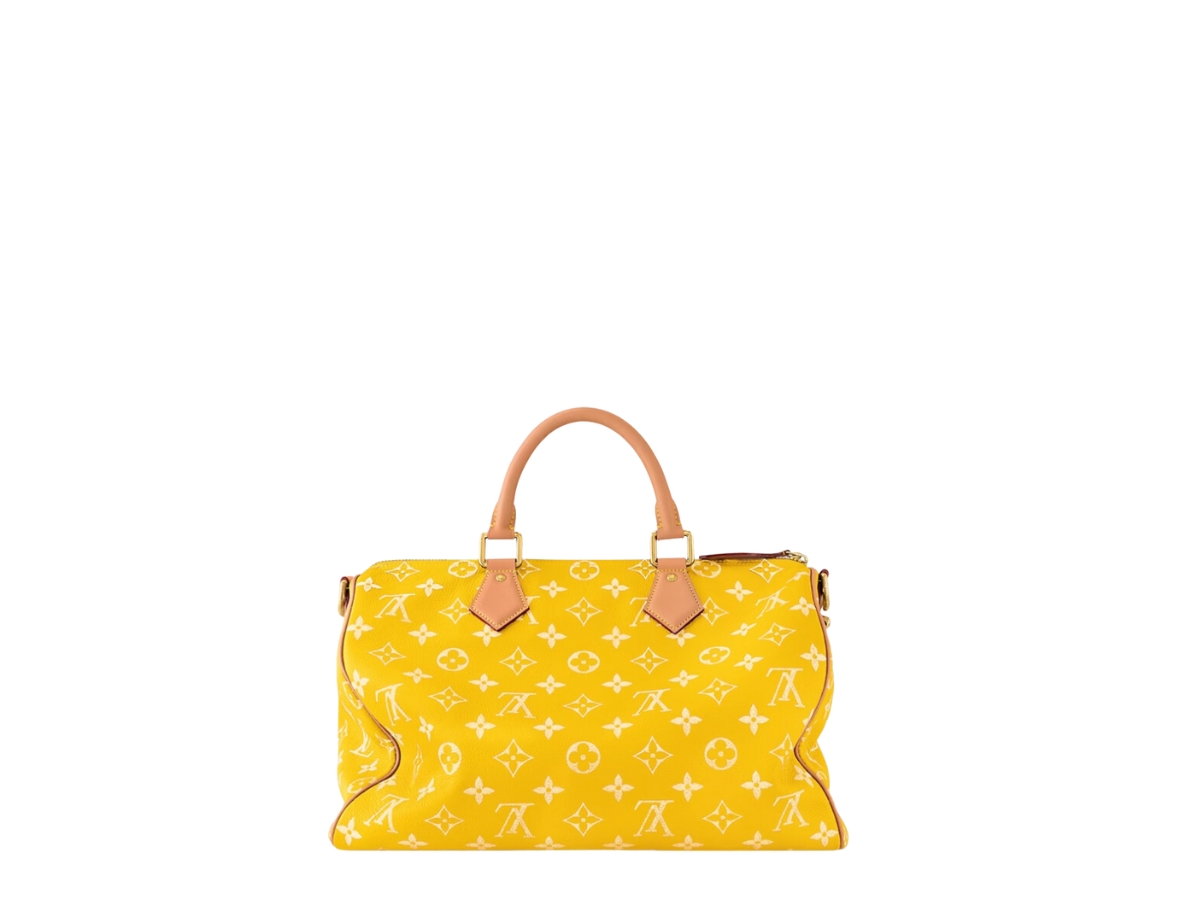 https://d2cva83hdk3bwc.cloudfront.net/louis-vuitton-speedy-p9-bandouliere-40-in-soft-calfskin-with-gold-color-hardware-jaune-mat-2.jpg