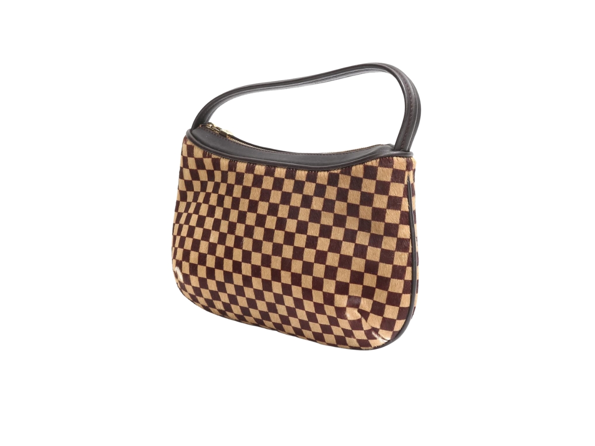 https://d2cva83hdk3bwc.cloudfront.net/louis-vuitton-tiger-handbag-brown-2.jpg