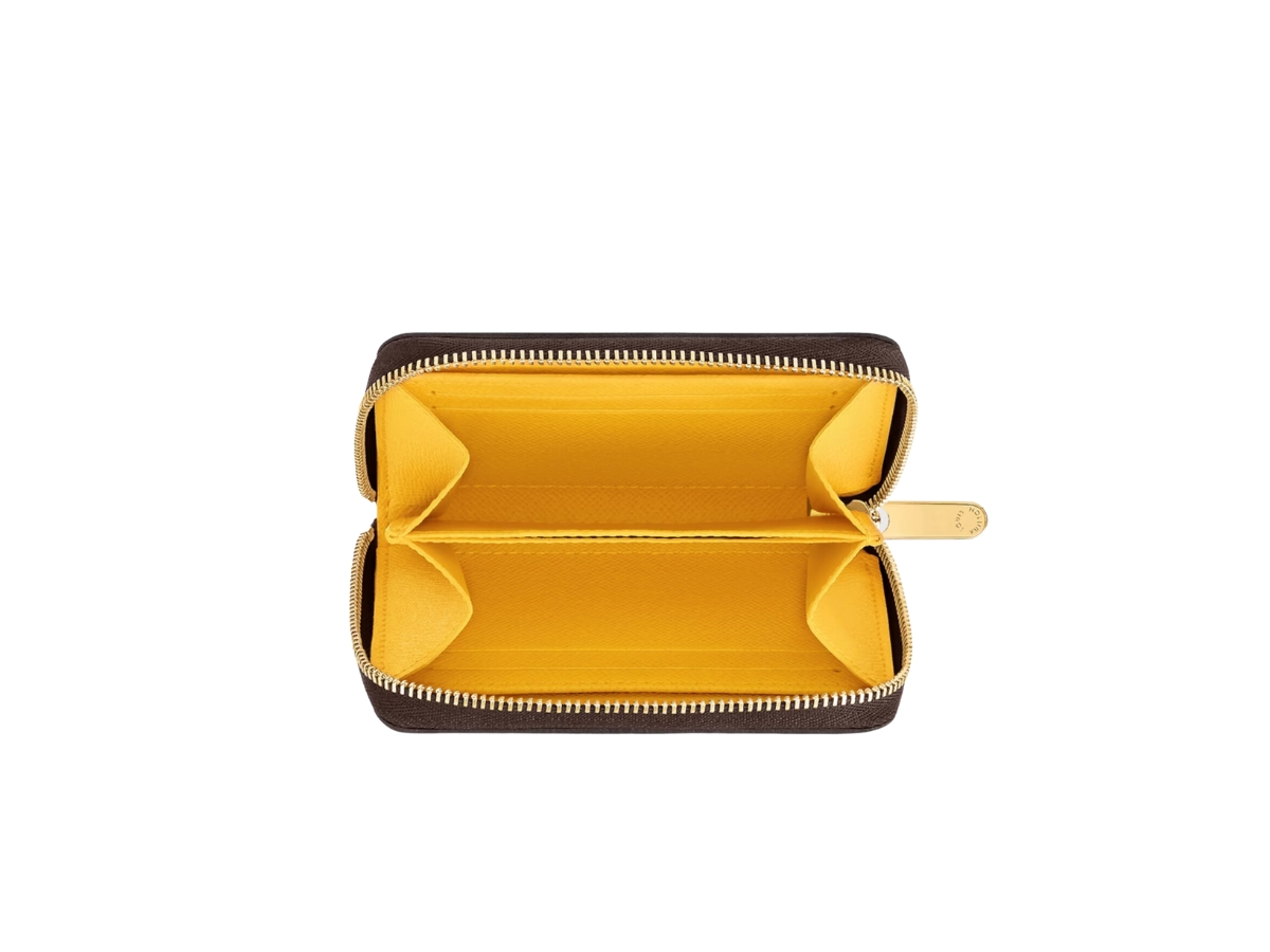 https://d2cva83hdk3bwc.cloudfront.net/louis-vuitton-zippy-coin-purse-in-monogram-coated-canvas-with-gold-color-hardware-yellow-3.jpg