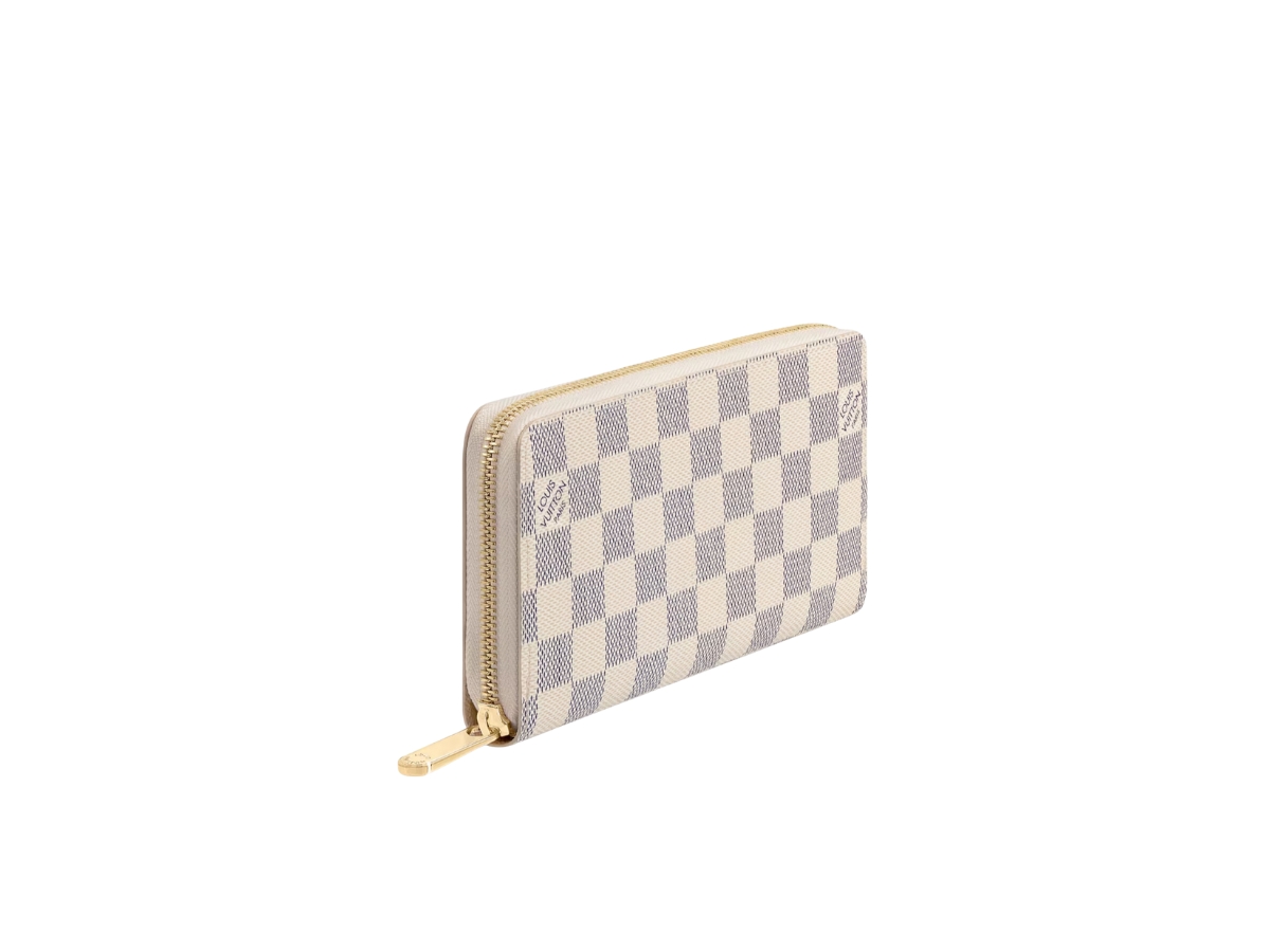 https://d2cva83hdk3bwc.cloudfront.net/louis-vuitton-zippy-wallet-in-damier-azur-coated-canvas-with-gold-color-hardware-beige-2.jpg