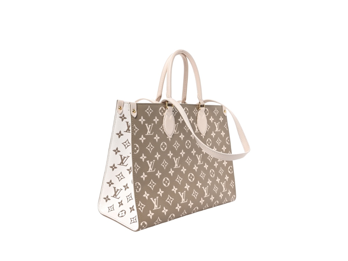https://d2cva83hdk3bwc.cloudfront.net/lv-tbblvomemsiclwgthkbc-louis-vuitton-onthego-mm-empreinte-monogram-spring-in-cowhide-leather-with-gold-tone-hardware-kaki-beige-cream-2.jpg