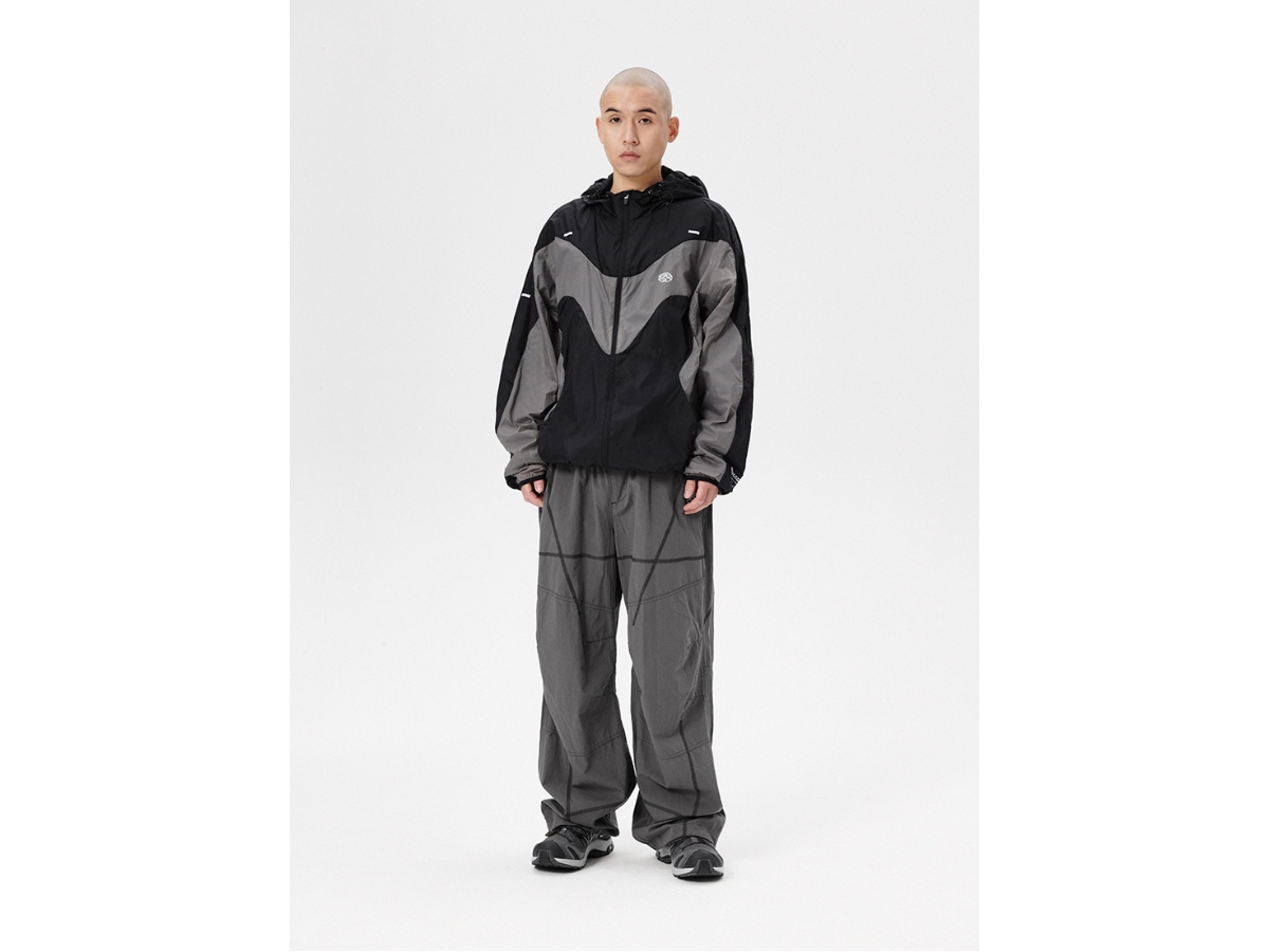 https://d2cva83hdk3bwc.cloudfront.net/mahagrid-cover-stitch-parachute-pant-black-3.jpg