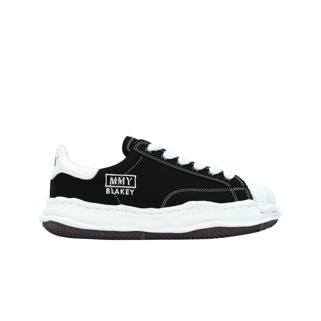 https://d2cva83hdk3bwc.cloudfront.net/maison-mihara-yasuhiro-blakey-og-sole-canvas-low-top-sneakers-black-white-2.jpg