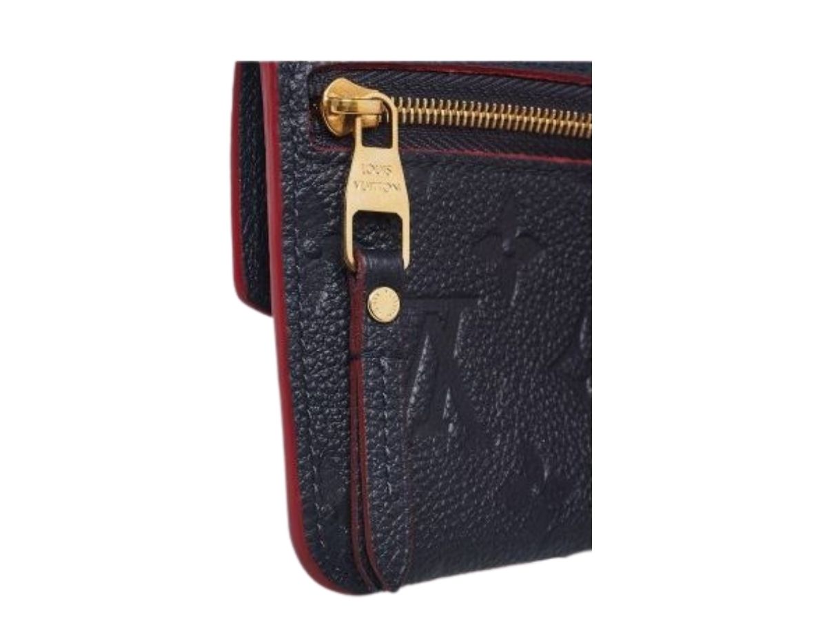 https://d2cva83hdk3bwc.cloudfront.net/marine-rouge-monogram-empreinte-leather-pochette-cles-key-and-change-holder-3.jpg