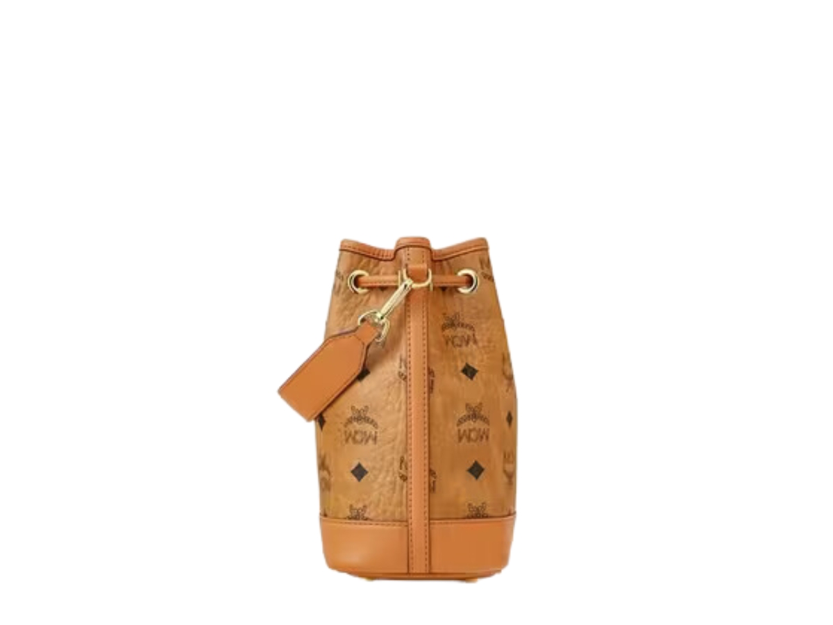 https://d2cva83hdk3bwc.cloudfront.net/mcm-dessau-drawstring-bag-mini-visetos-cognac-3.jpg