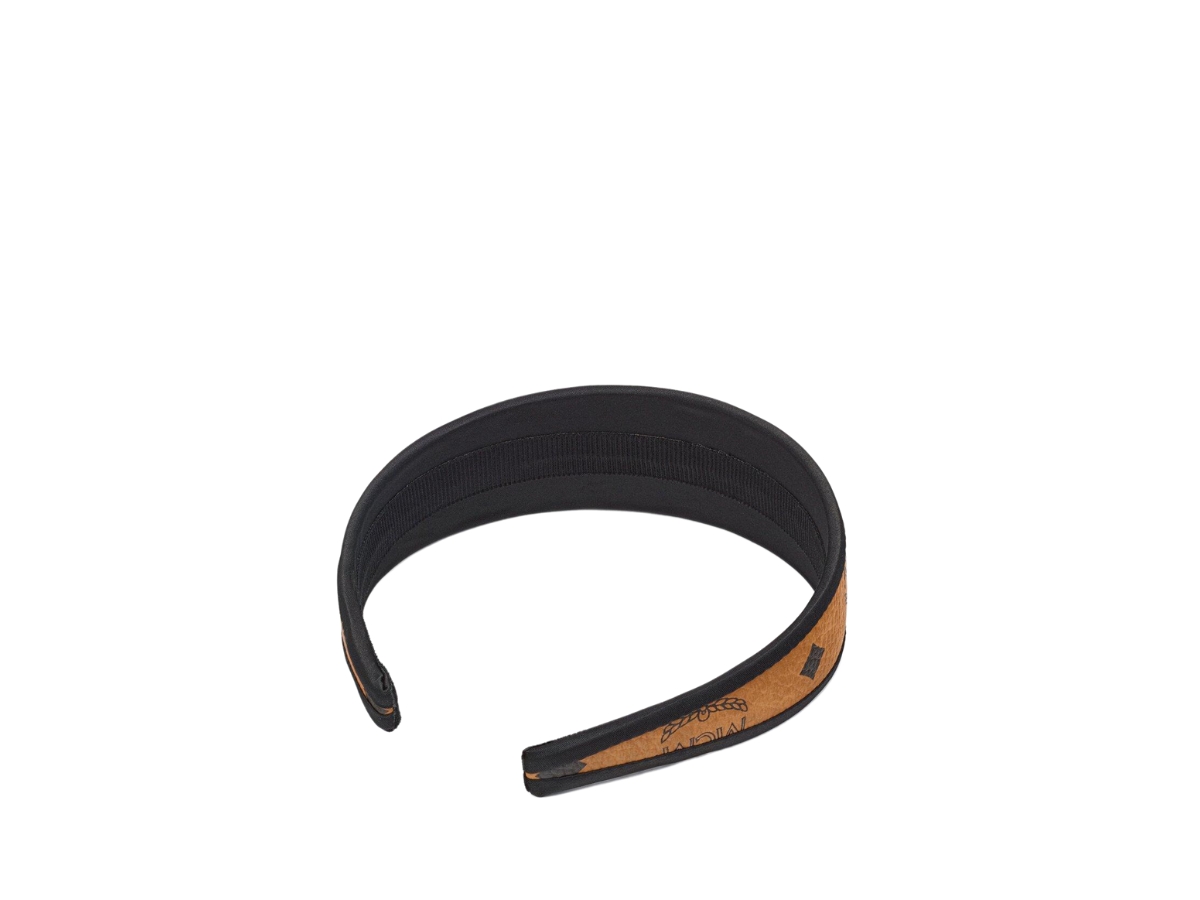 https://d2cva83hdk3bwc.cloudfront.net/mcm-headband-in-visetos-cognac-3.jpg