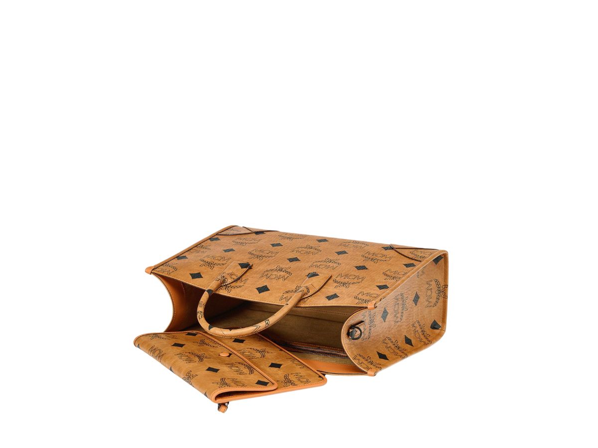 https://d2cva83hdk3bwc.cloudfront.net/mcm-m-nchen-tote-in-maxi-visetos-cognac-large-3.jpg
