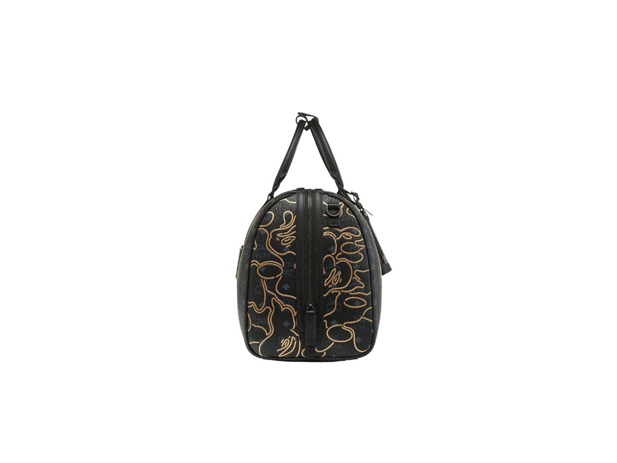 https://d2cva83hdk3bwc.cloudfront.net/mcm-x-bape-ottomar-weekender-bag-in-visetos-black-2.jpg