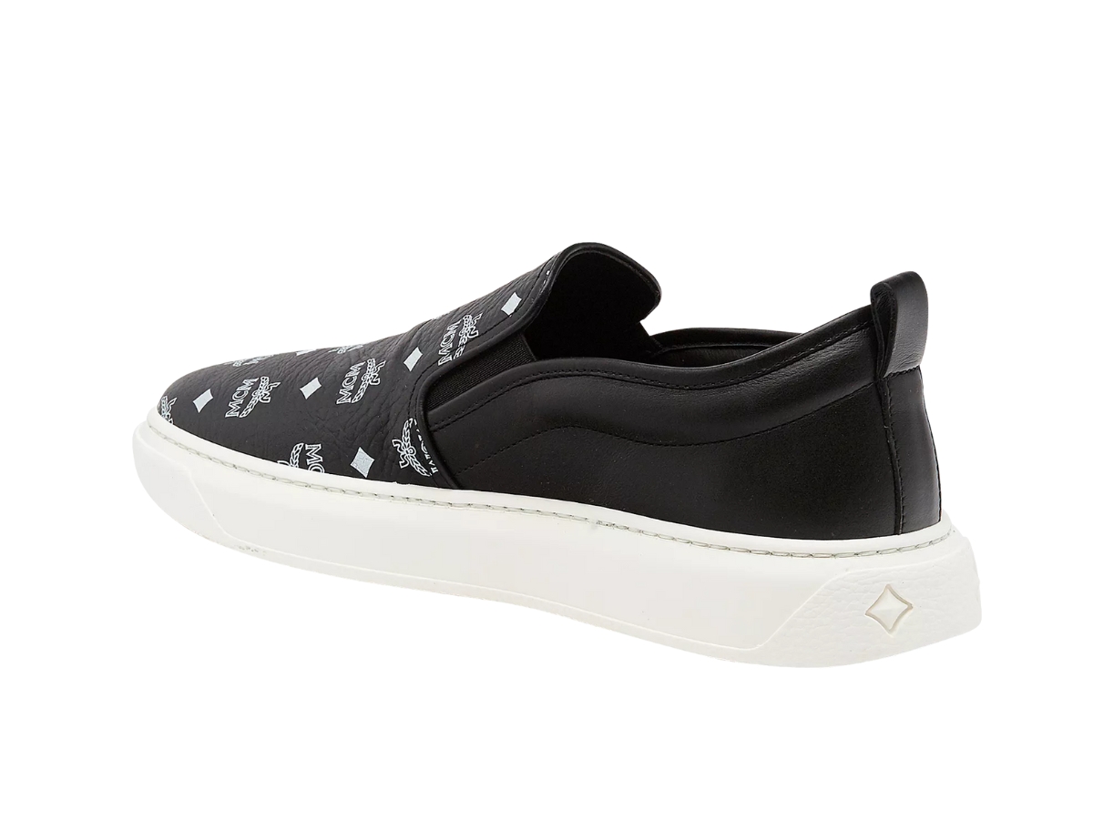 https://d2cva83hdk3bwc.cloudfront.net/mex8smm22bk045-mcm-slip-on-sneakers-in-visetos-black-3.jpg