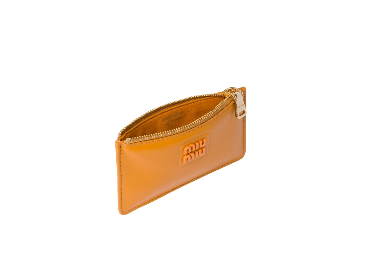 https://d2cva83hdk3bwc.cloudfront.net/miu-miu-leather-envelope-wallet-in-leather-with-varnished-metal-lettering-logo-pomegranate-yellow-3.jpg