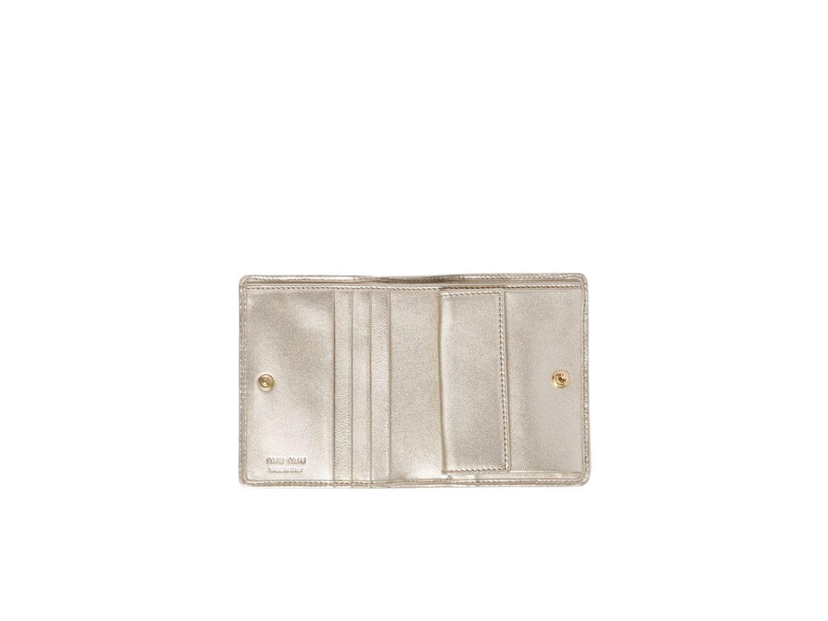 https://d2cva83hdk3bwc.cloudfront.net/miu-miu-small-matelass--nappa-leather-wallet-in-leather-with-metal-lettering-logo-pyrite-3.jpg