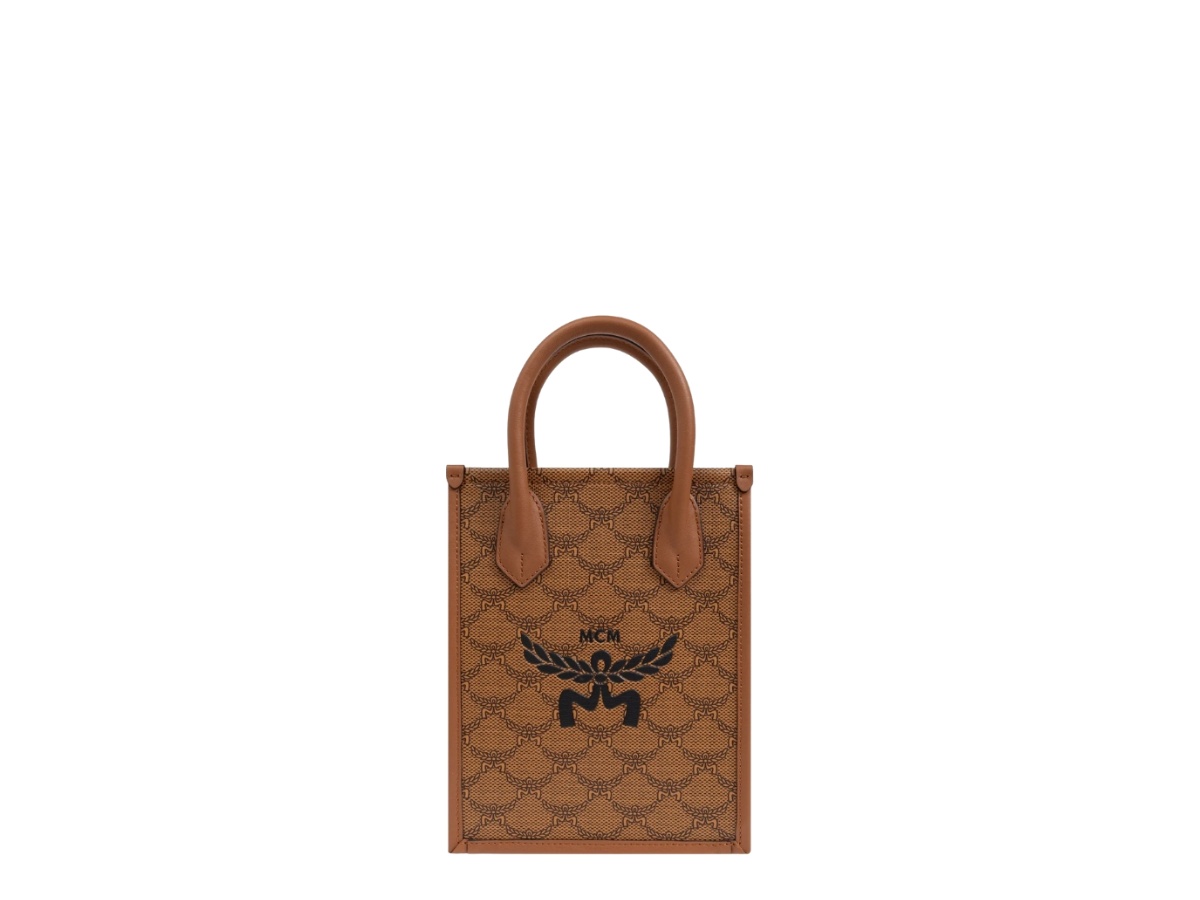 https://d2cva83hdk3bwc.cloudfront.net/mmteaac02co0-mcm-monogram-printed-shoulder-bag-cognac-1.jpg