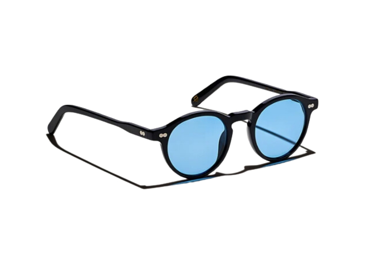https://d2cva83hdk3bwc.cloudfront.net/moscot-miltzen-black-with-custom-made-tints-46-mm-in-black-acetate-frame-two-dots-with-celebrity-blue-lenses-2.jpg