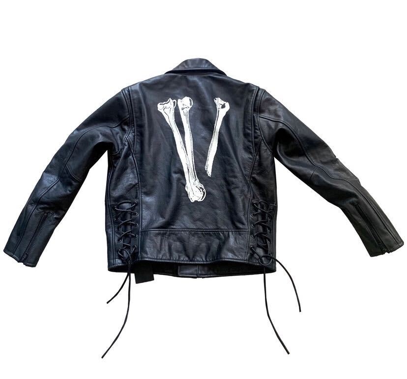 https://d2cva83hdk3bwc.cloudfront.net/neighborhood-x-vlone-skeleton-leather-jacket-black-white-2.jpg